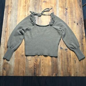 Puff sleeve sweater with open back that ties